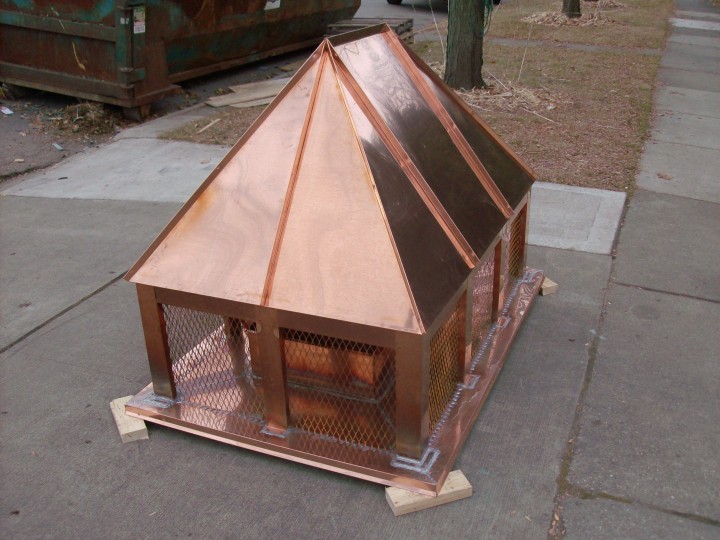Custom copper chimney cap flue cover shroud.