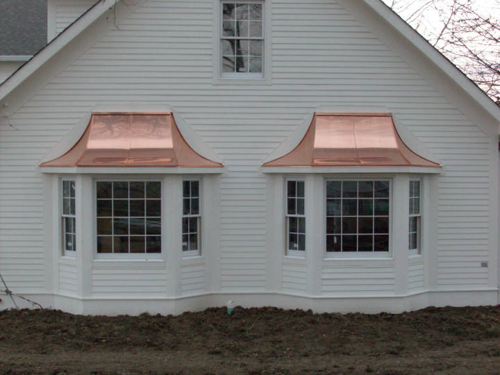 Copper bay window roofs.