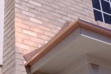 Custom copper gutter, curved counter flashing.