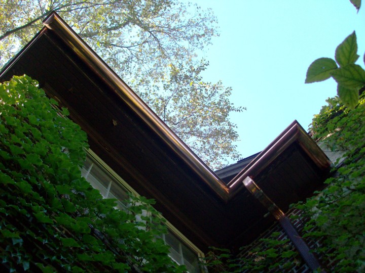 Custom copper half-round gutters.